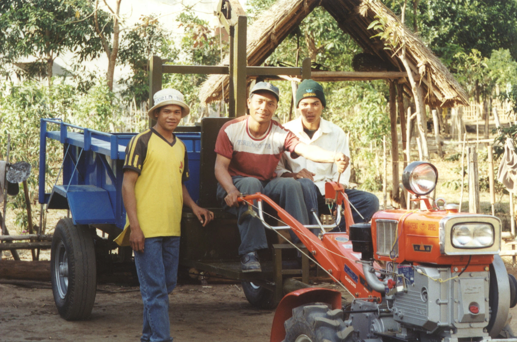 Montagnard farmers with walk-behind
tractor