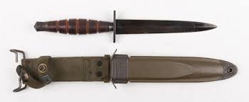 type 3 Fairbairn-Sykes commando
dagger with sheath made in Japan during the Vietnam-era