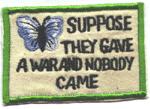novelty protest patch with
butterfly and slogan