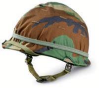 steel helmet with camo cover and
elastic brush band